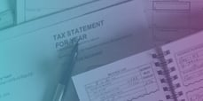 picture of a tax statement with pen