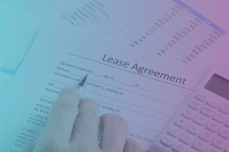 a person review a lease agreement