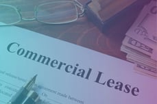 a commercial lease contract on a desk