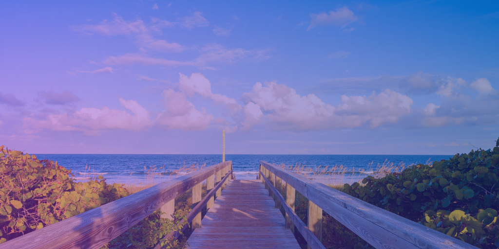 A serene beach with palm trees, symbolizing the upcoming NRTA Expanding Knowledge National Conference 2023 in Fort Lauderdale. Get ready for insightful sessions and industry connections. #NRTAConference #LeaseManagement
